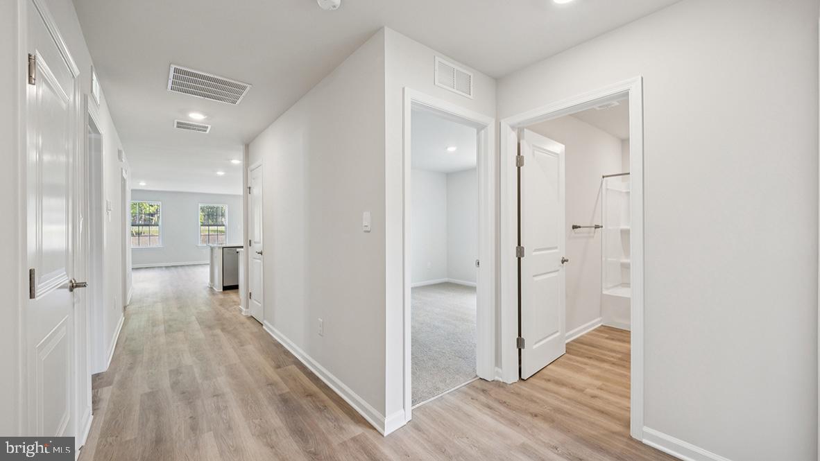 311 Vero Road Egg Harbor Township, NJ 08234 - Photo 7 of 27 a view of a hallway with wooden floor