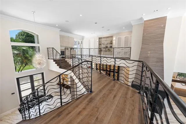 a backyard of a house with yard and outdoor seating