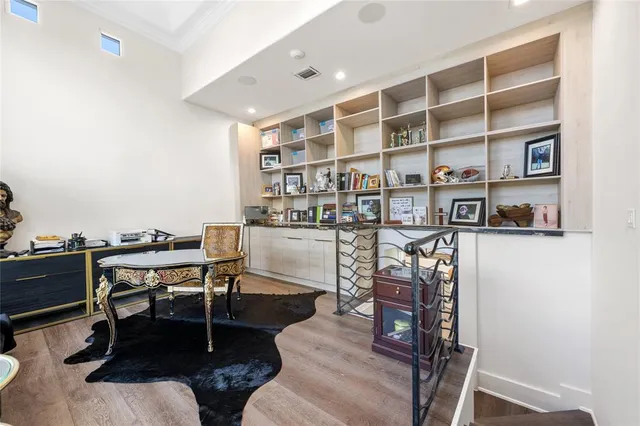 a kitchen with a sink and a stove top oven
