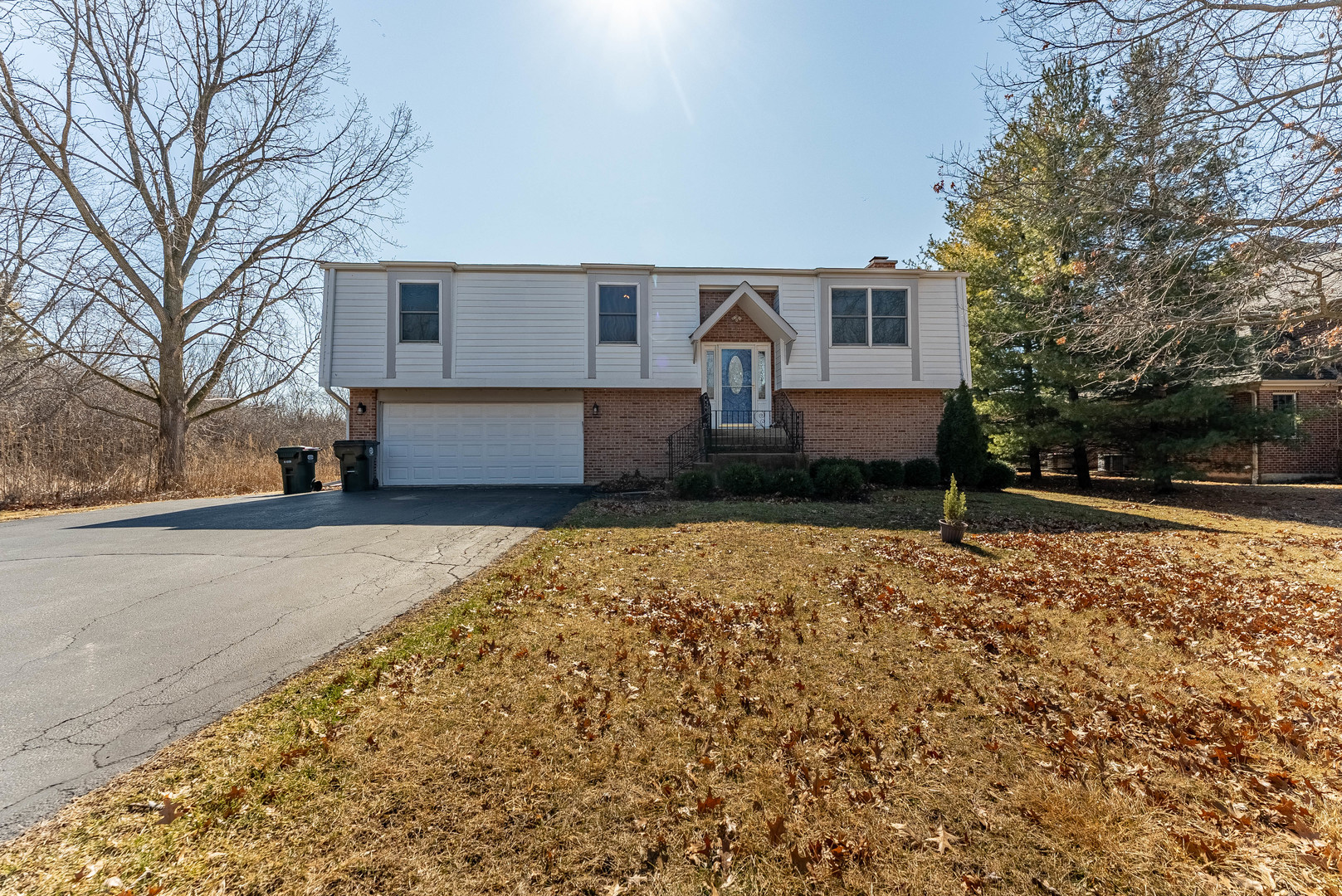 105 Roxborough Place Inverness, IL 60010 - Photo 1 of 35 front view of a house with a yard