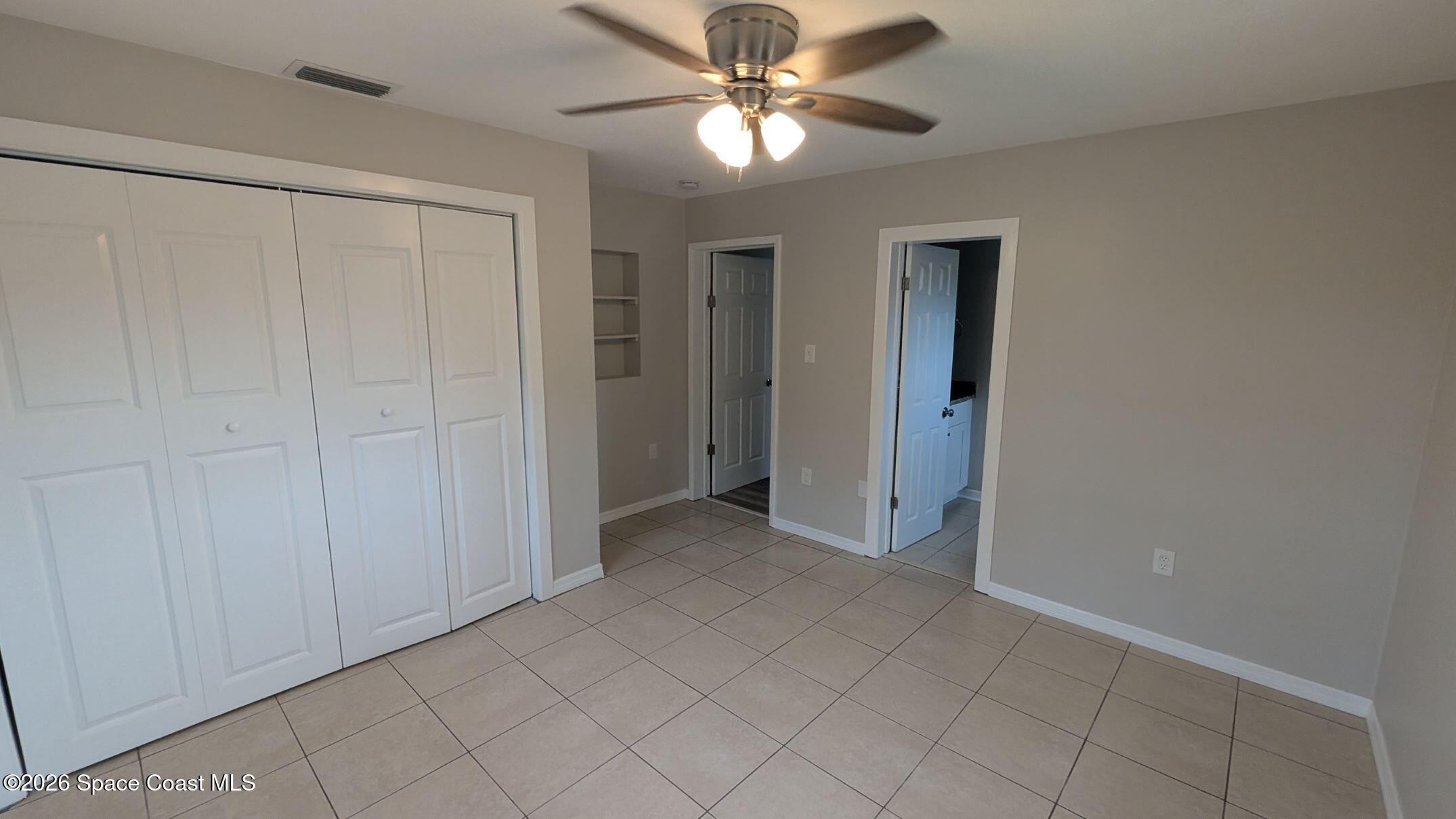 108 1st Street Merritt Island, FL 32953 - Photo 19 of 40 a view of an empty room