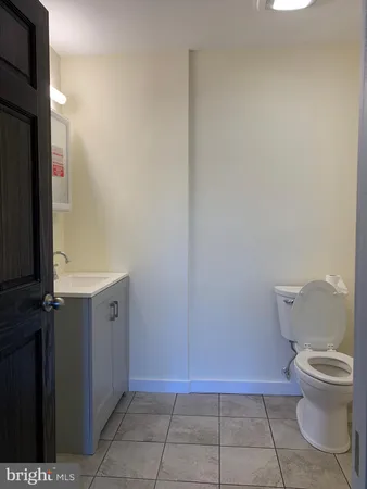 a bathroom with a toilet