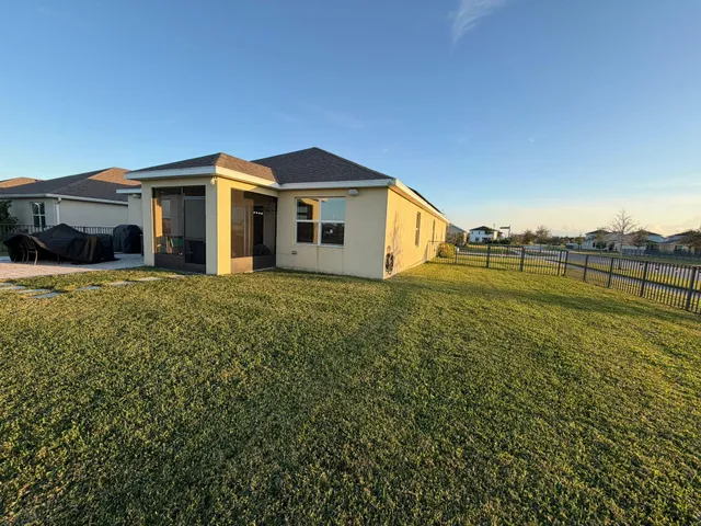 a view of a house with a big yard