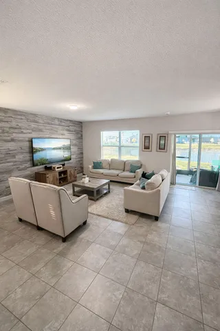 a living room with furniture and a couch