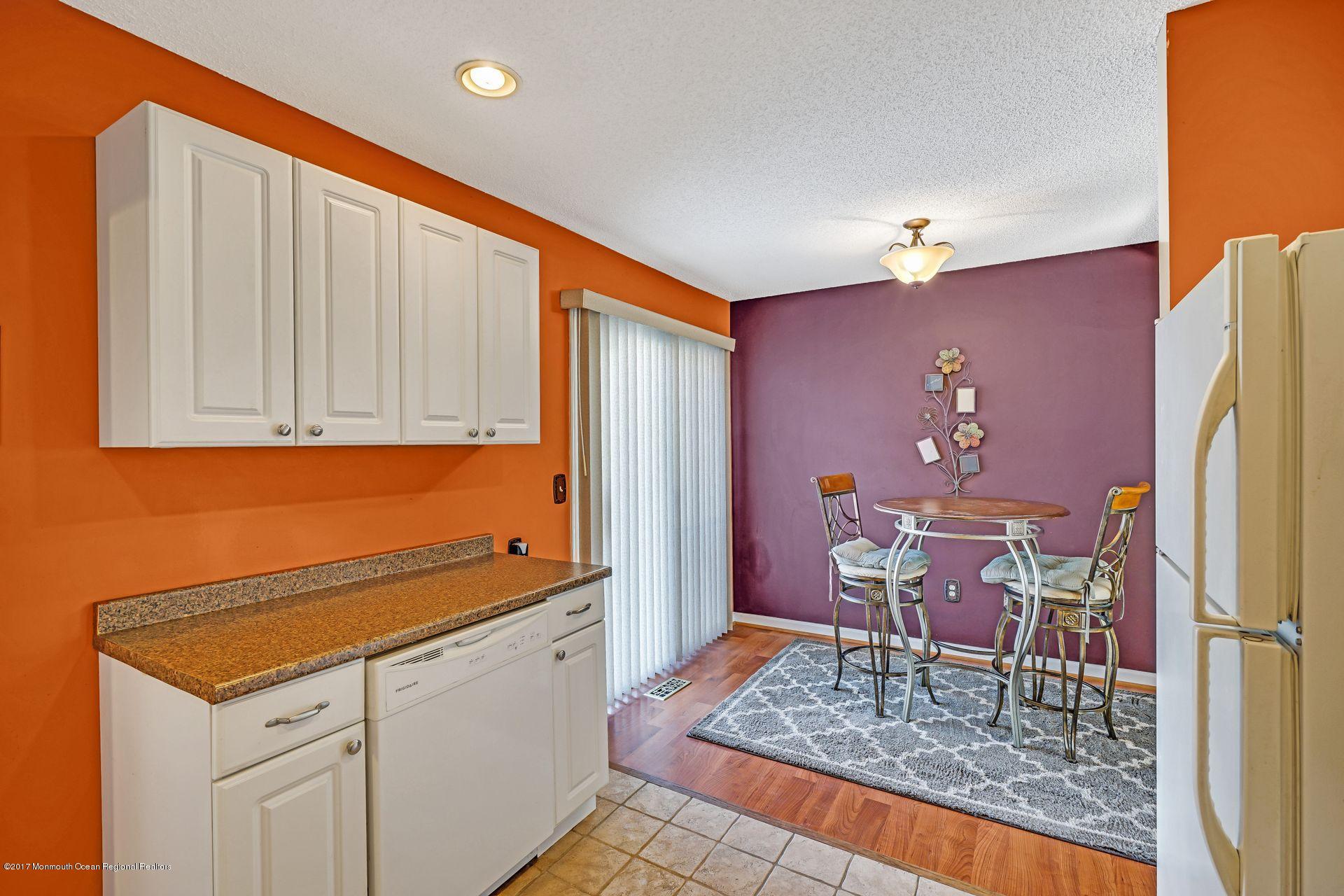 36 Mallard Road Bayville, NJ 08721 - Photo 13 of 28 a kitchen with stainless steel appliances granite countertop a refrigerator and cabinets