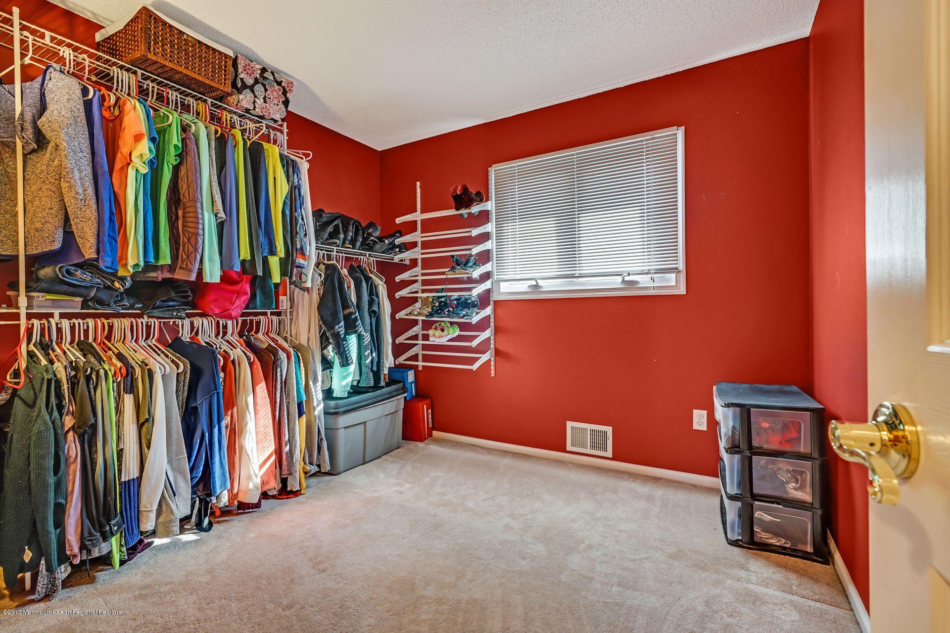 36 Mallard Road Bayville, NJ 08721 - Photo 18 of 28 a view of walk in closet with clothes