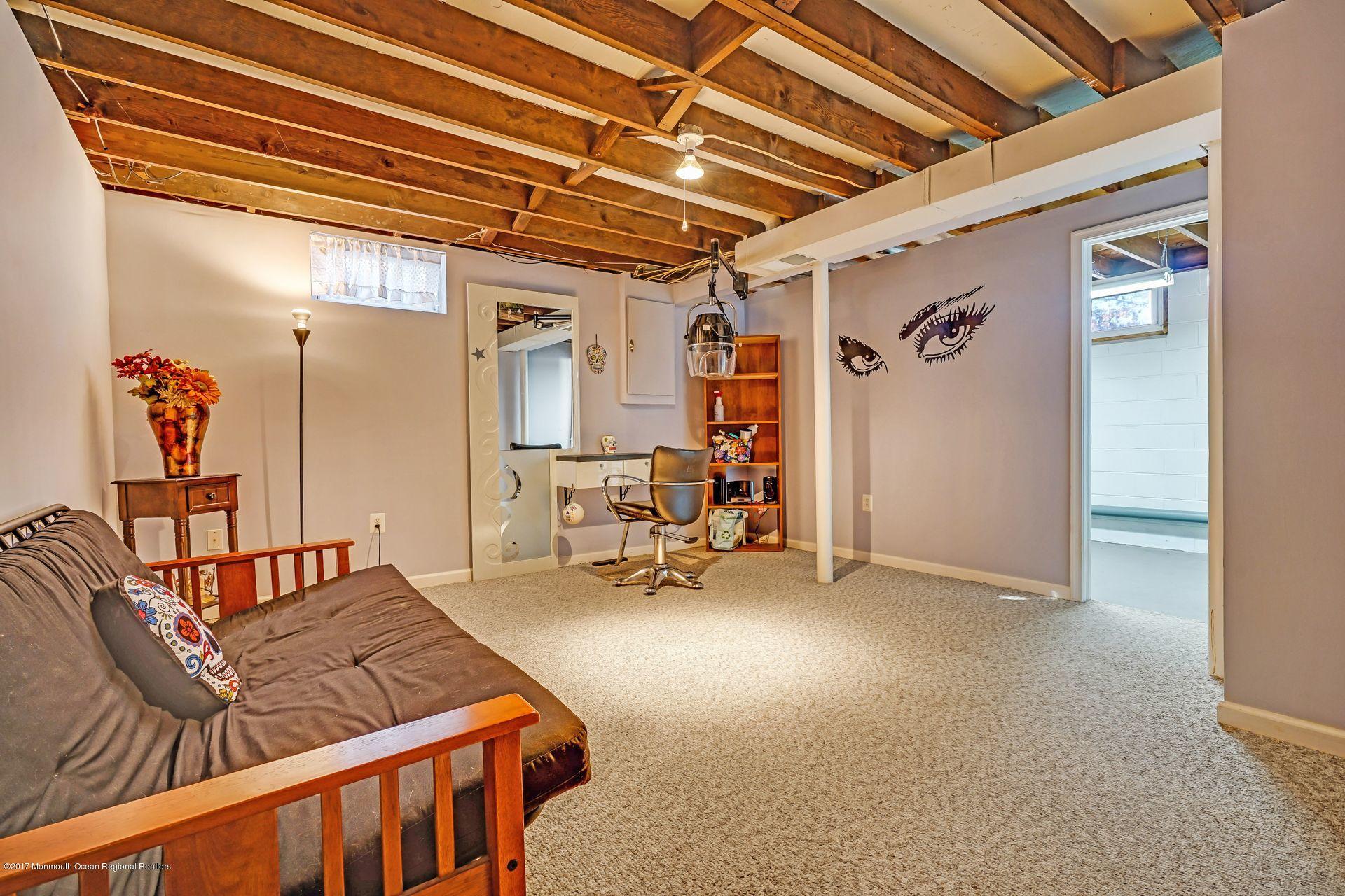 36 Mallard Road Bayville, NJ 08721 - Photo 20 of 28 a view of a livingroom with furniture and a couch