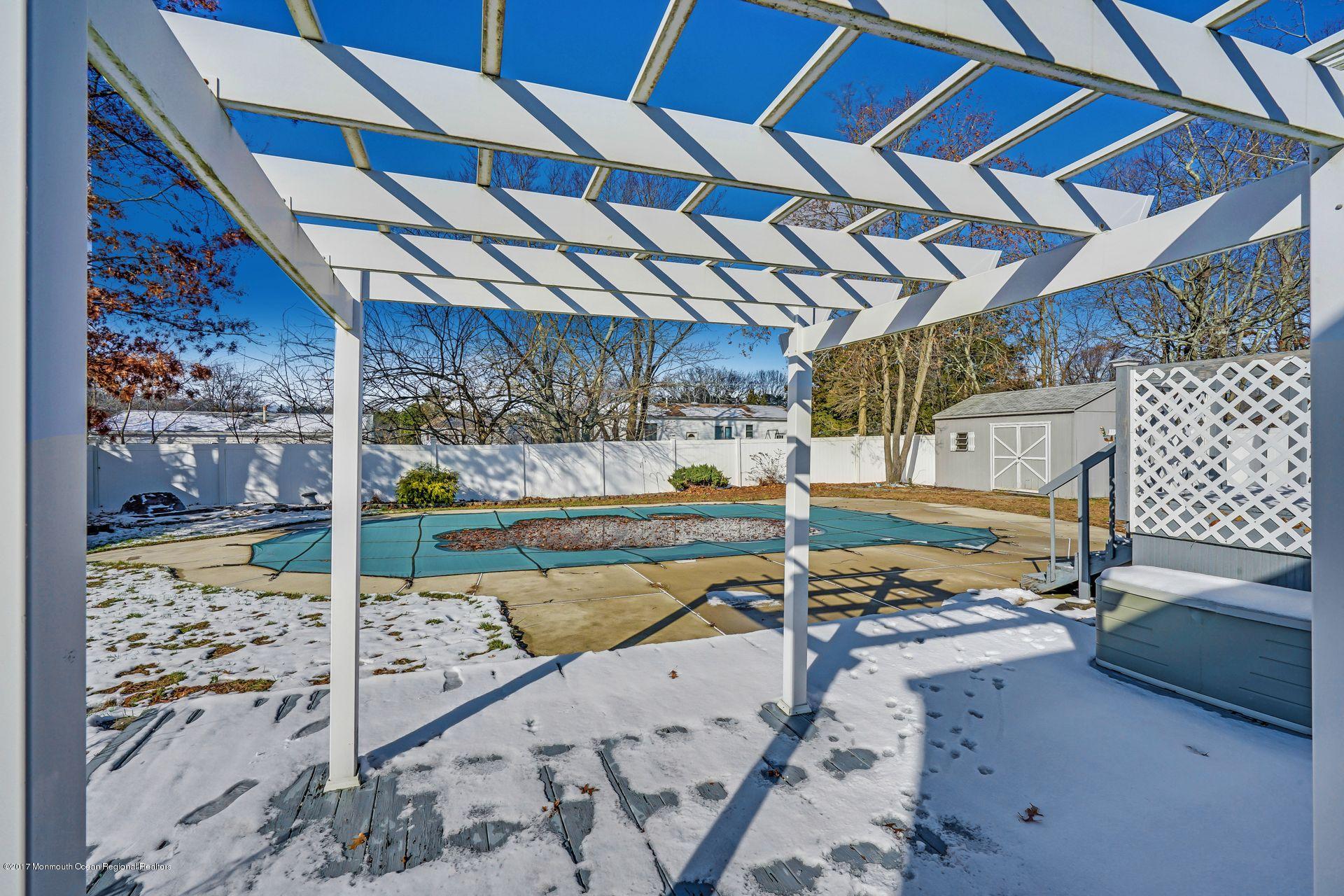 36 Mallard Road Bayville, NJ 08721 - Photo 26 of 28 a view of a backyard with wooden deck