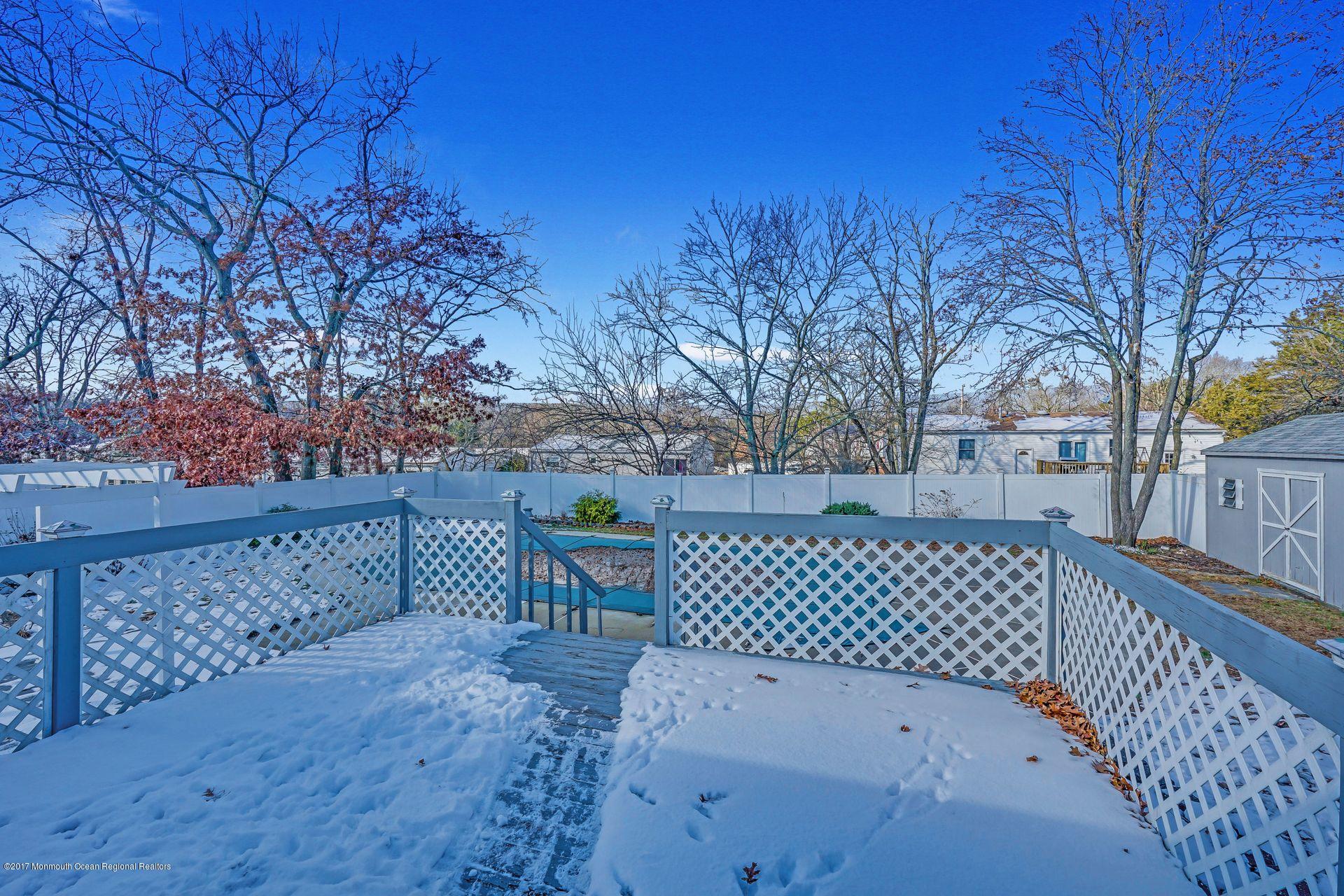 36 Mallard Road Bayville, NJ 08721 - Photo 27 of 28 a view of a yard with wooden fence