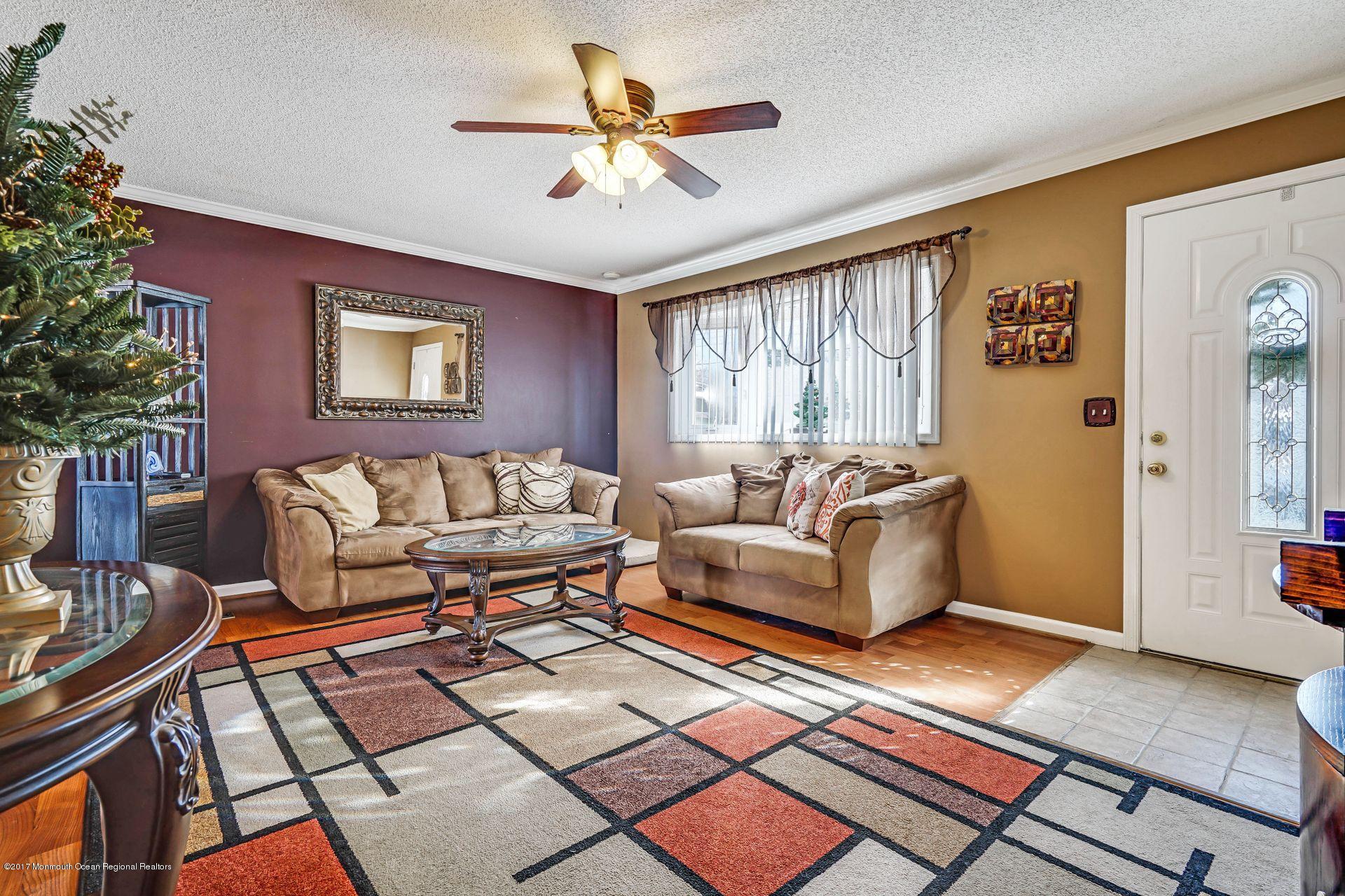 36 Mallard Road Bayville, NJ 08721 - Photo 4 of 28 a living room with furniture and a large window