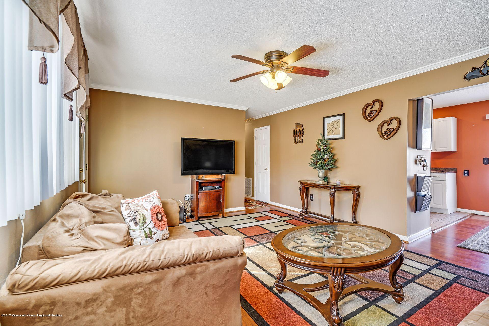 36 Mallard Road Bayville, NJ 08721 - Photo 5 of 28 a living room with furniture and a flat screen tv