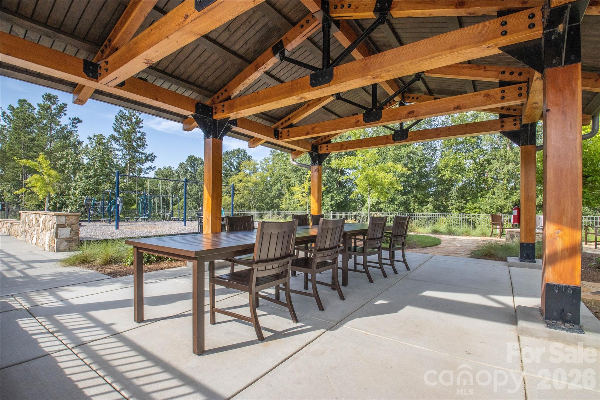 1633 Half Pint Loop Fort Mill, SC 29708 - Photo 48 of 48 a view of a patio with table and chairs and wooden floor