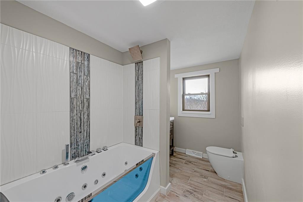 201 Grazier Street Johnstown, PA 15905 - Photo 16 of 25 a bathroom with a bathtub and a sink