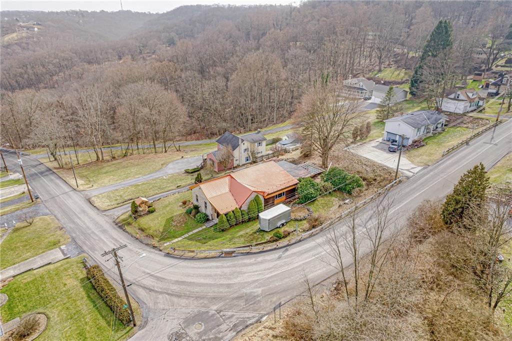 201 Grazier Street Johnstown, PA 15905 - Photo 2 of 25 a view of a swimming pool with a yard