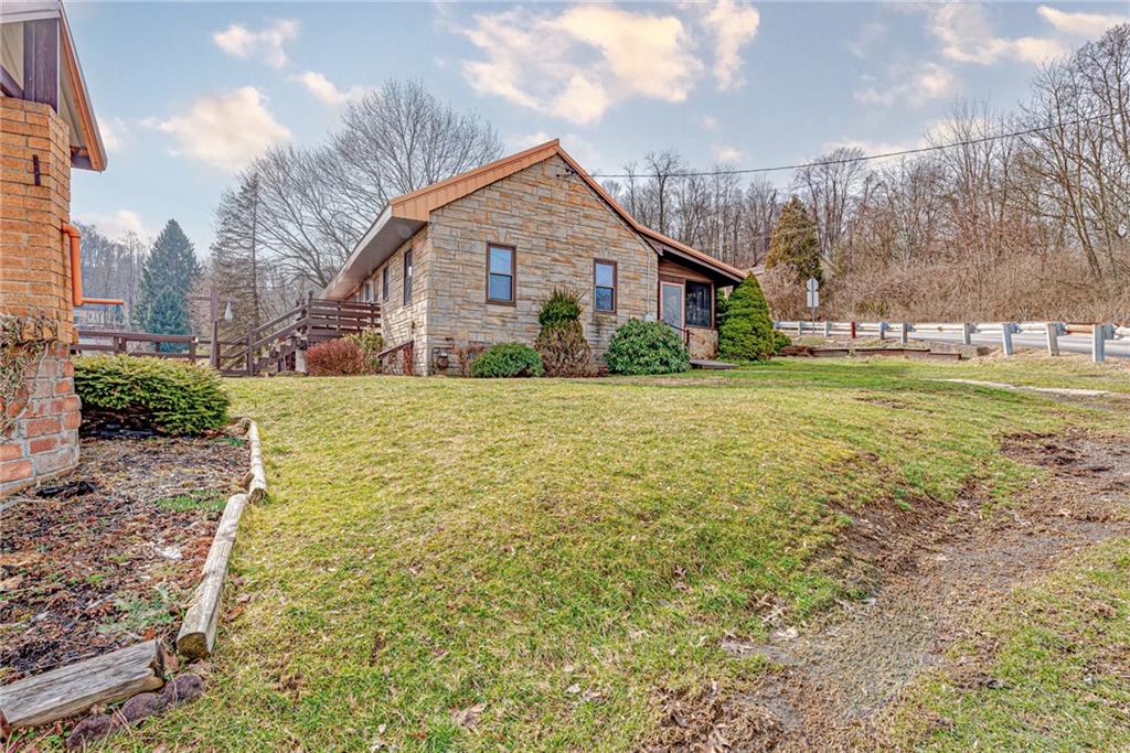 201 Grazier Street Johnstown, PA 15905 - Photo 3 of 25 a front view of a house with a yard