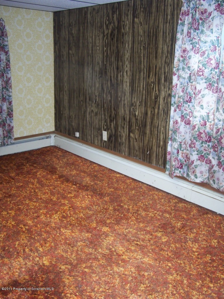373 Wimmers Road Lake Ariel, PA 18436 - Photo 10 of 11 a view of an empty room with wooden floor
