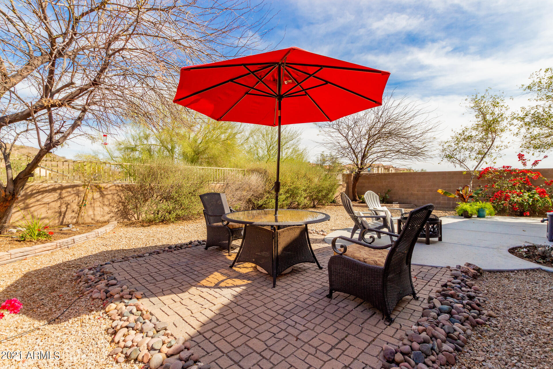 28607 North Nobel Road Phoenix, AZ 85085 - Photo 34 of 38 an outdoor sitting area with furniture and wooden floor
