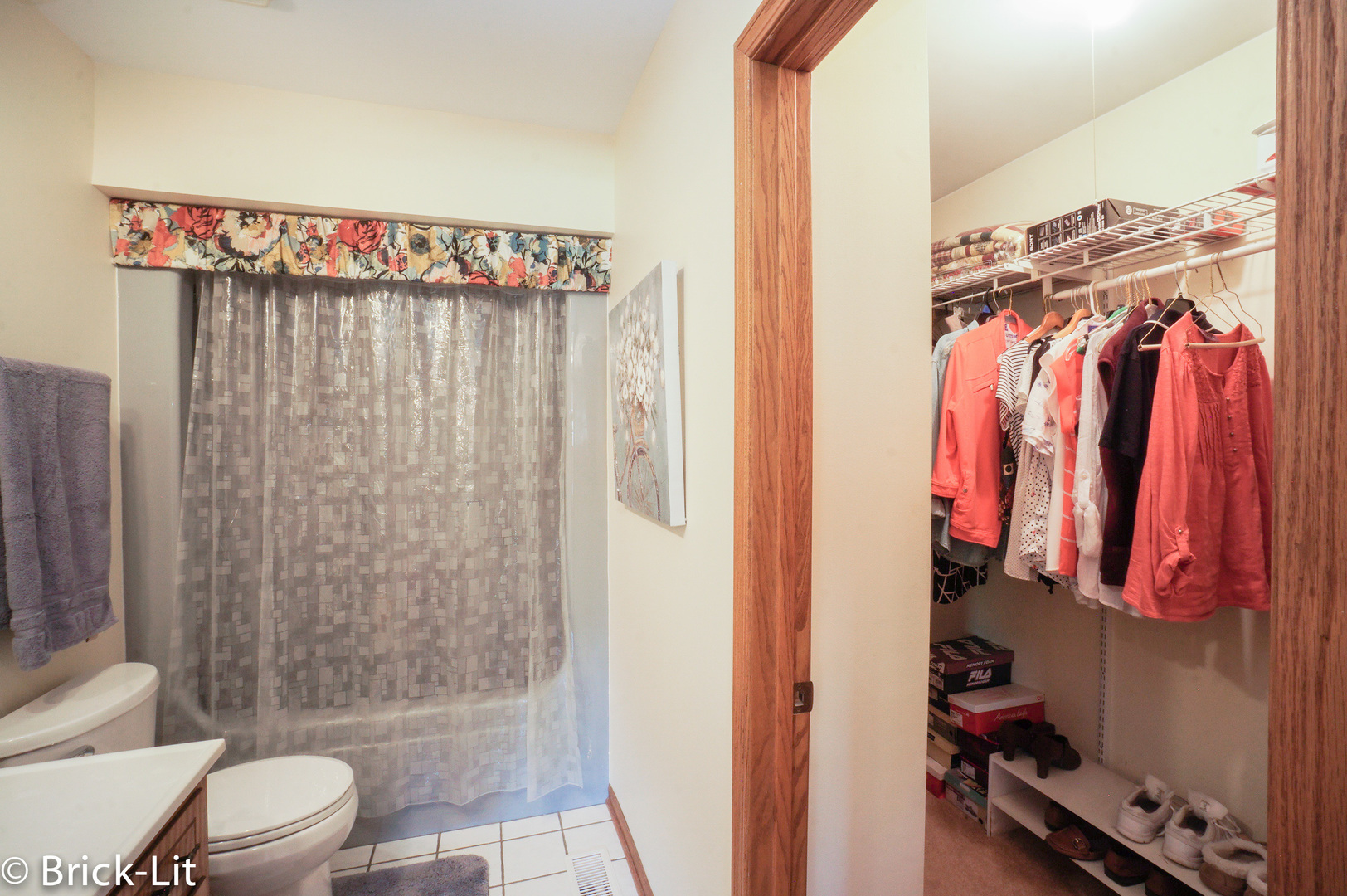 19227 Weber Road Mokena, IL 60448 - Photo 16 of 19 a bathroom with a shower curtain and a toilet