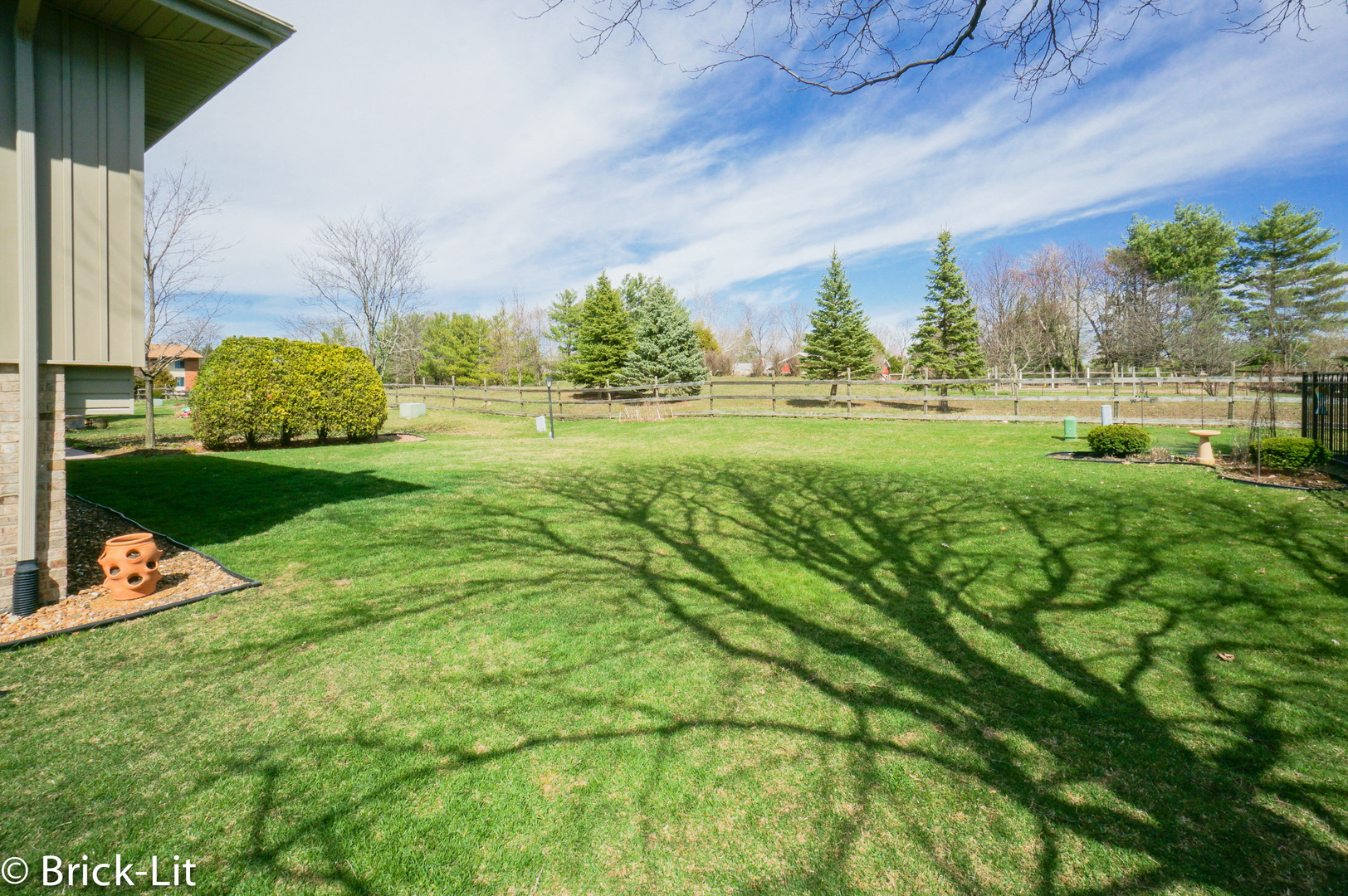 19227 Weber Road Mokena, IL 60448 - Photo 4 of 19 a view of a garden with an outdoor space
