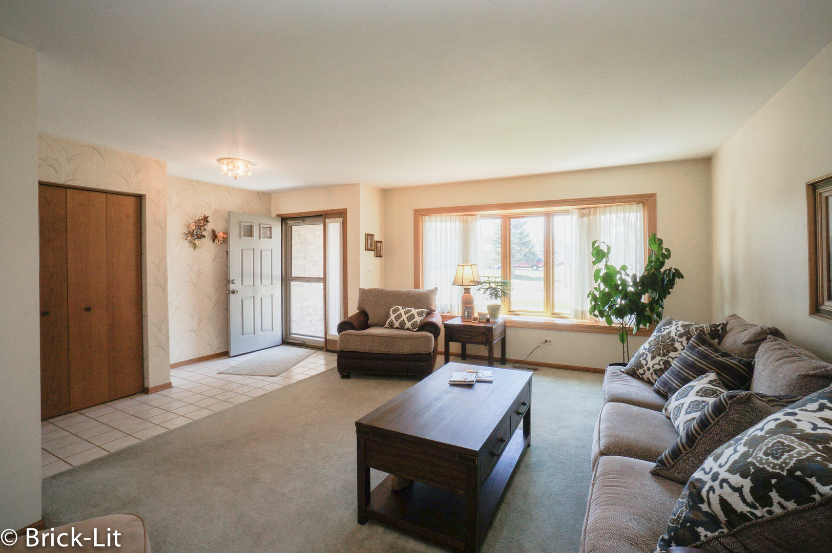 19227 Weber Road Mokena, IL 60448 - Photo 7 of 19 a living room with furniture and a large window