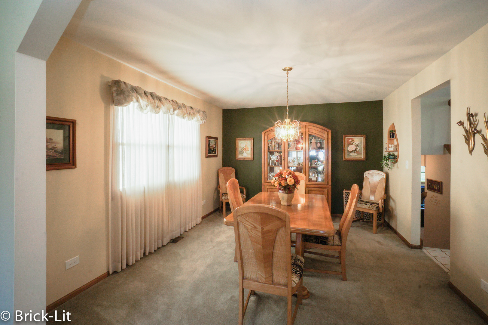 19227 Weber Road Mokena, IL 60448 - Photo 8 of 19 a view of a dining room with furniture and chandelier