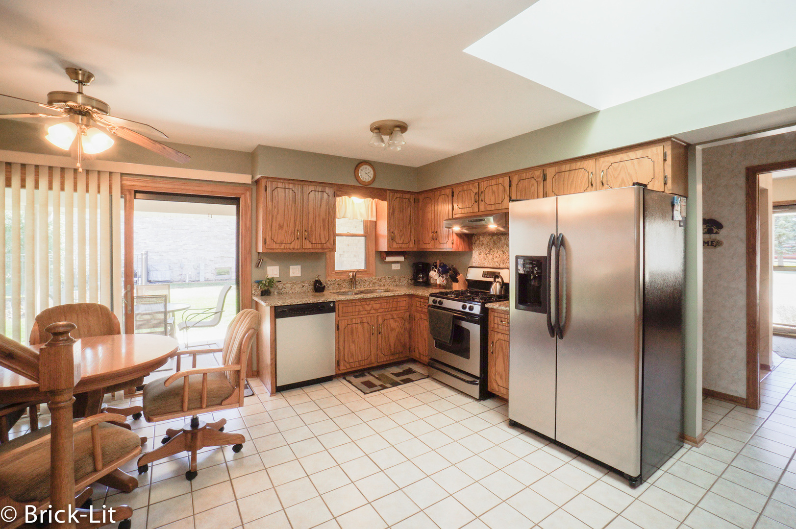 19227 Weber Road Mokena, IL 60448 - Photo 10 of 19 a kitchen with granite countertop a counter top space appliances and a counter top space