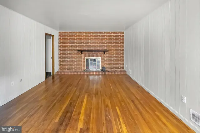 a bathroom with a sink and vanity