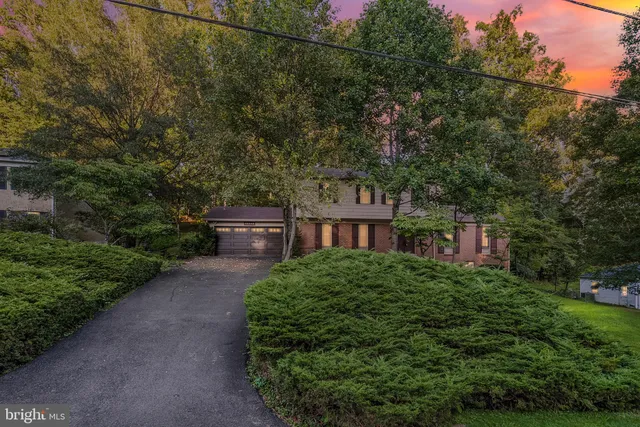 a house view with a garden space