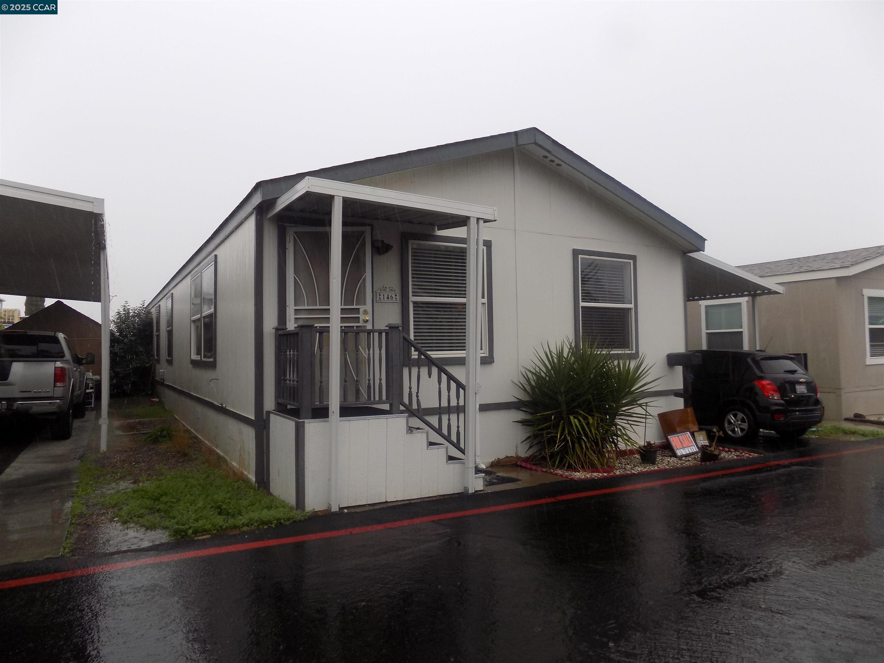 55 Pacifica Avenue, Unit 146 Bay Point, CA 94565 - Photo 3 of 18 a house view with a garden space