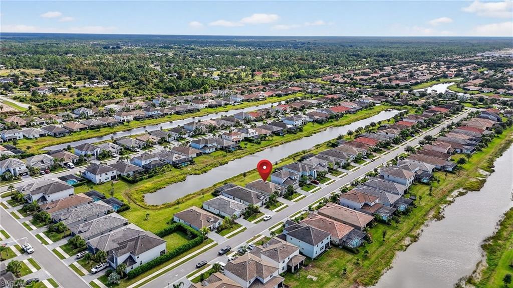 2126 Hamlin Street Naples, FL 34120 - Photo 32 of 38 an aerial view of a city