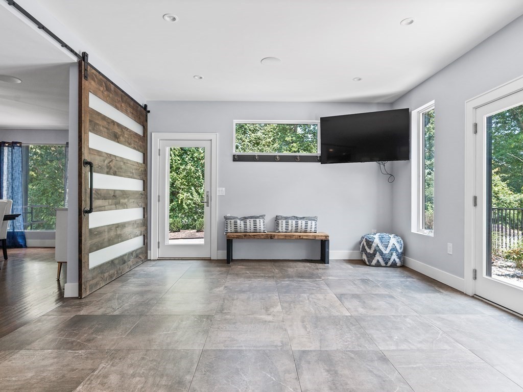 49 Reed Street Rehoboth, MA 02769 - Photo 13 of 40 a view of livingroom with furniture and windows