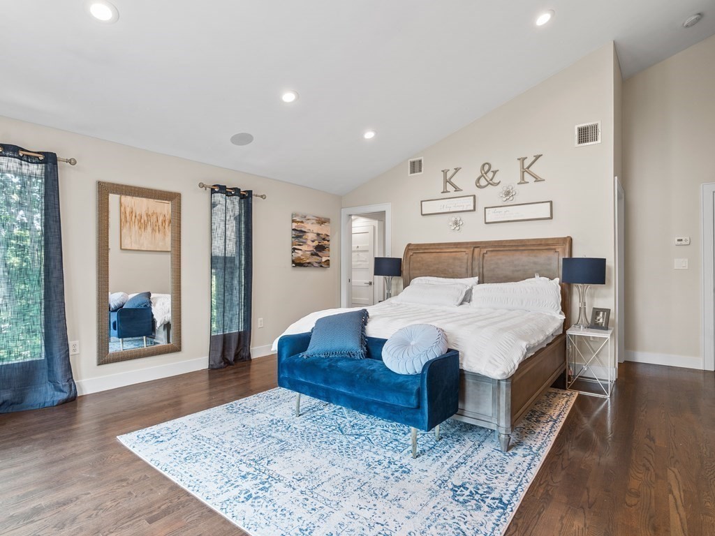 49 Reed Street Rehoboth, MA 02769 - Photo 20 of 40 a bedroom with a bed and wooden floor