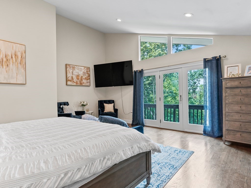 49 Reed Street Rehoboth, MA 02769 - Photo 21 of 40 a spacious bedroom with a bed and a television