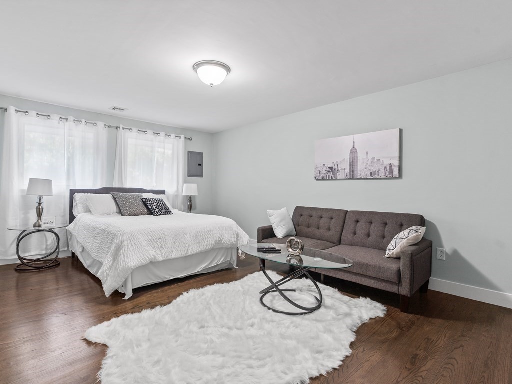 49 Reed Street Rehoboth, MA 02769 - Photo 24 of 40 a bedroom with a bed and a couch