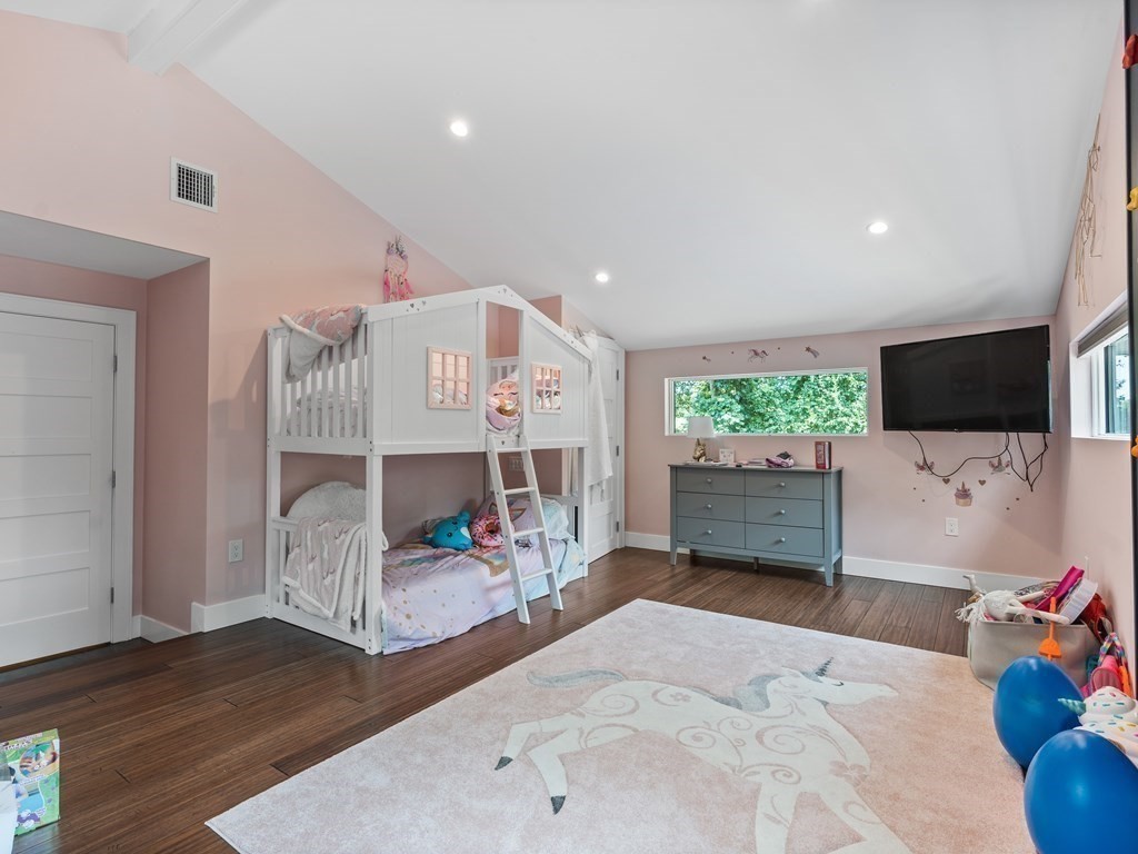 49 Reed Street Rehoboth, MA 02769 - Photo 28 of 40 a living room with furniture and a flat screen tv