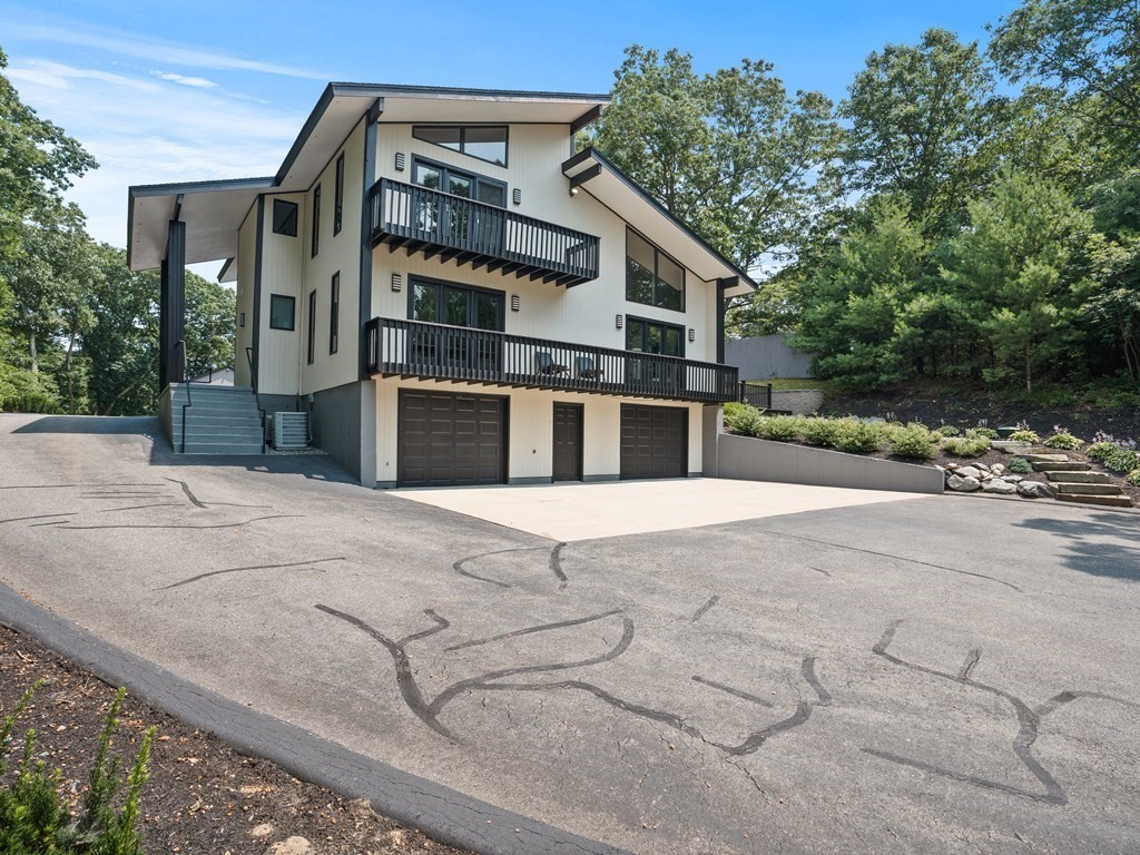 49 Reed Street Rehoboth, MA 02769 - Photo 3 of 40 a front view of a house with a yard