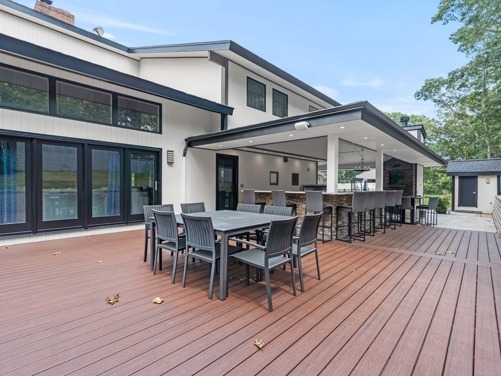 49 Reed Street Rehoboth, MA 02769 - Photo 32 of 40 a view of a house with sitting area and furniture