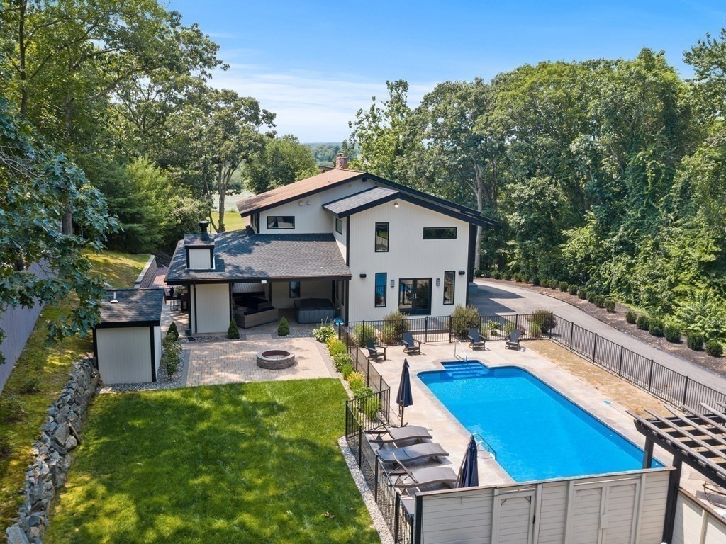 49 Reed Street Rehoboth, MA 02769 - Photo 37 of 40 a view of house with backyard outdoor seating and green space