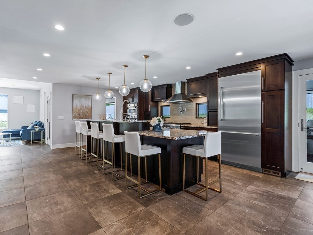 49 Reed Street Rehoboth, MA 02769 - Photo 5 of 40 a large kitchen with lots of counter space and appliances