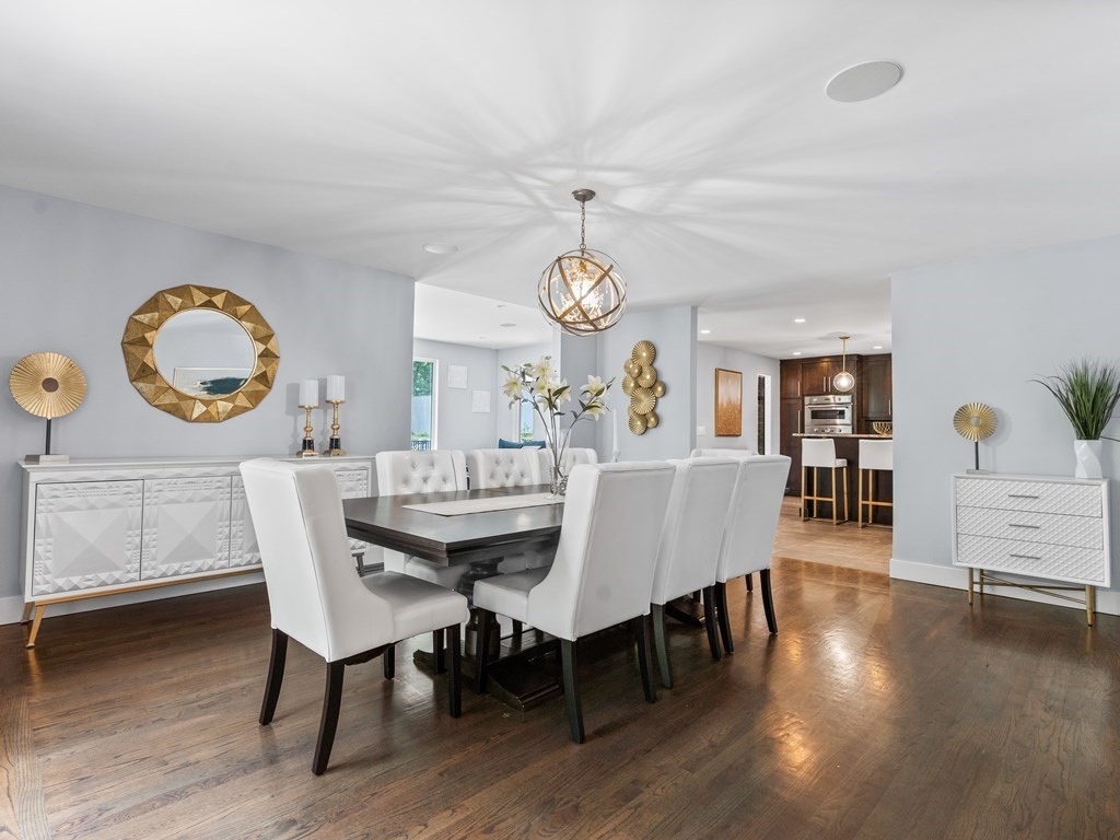 49 Reed Street Rehoboth, MA 02769 - Photo 9 of 40 a view of a dining room with furniture and wooden floor