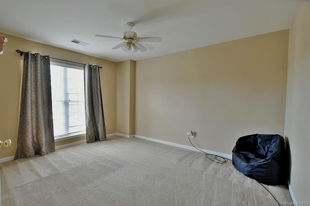 6306 Hawks Eye Court Fort Mill, SC 29708 - Photo 21 of 26 a living room with furniture and a window