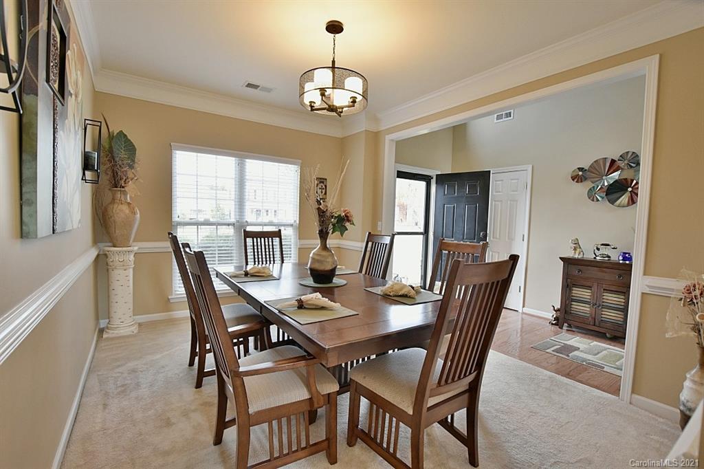 6306 Hawks Eye Court Fort Mill, SC 29708 - Photo 4 of 26 a view of a dining room with furniture and window