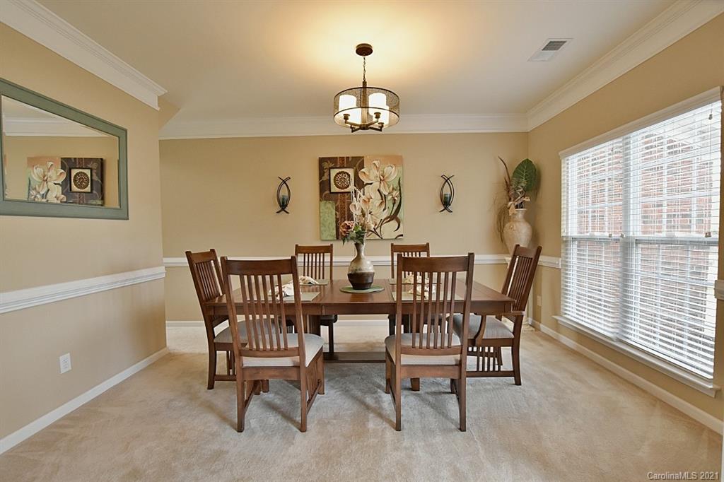 6306 Hawks Eye Court Fort Mill, SC 29708 - Photo 5 of 26 a view of a dining room with furniture window and outside view