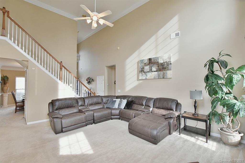 6306 Hawks Eye Court Fort Mill, SC 29708 - Photo 6 of 26 a living room with furniture and a potted plant