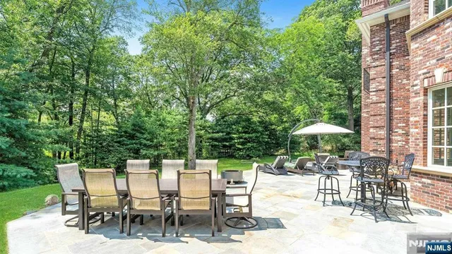 a view of house with yard