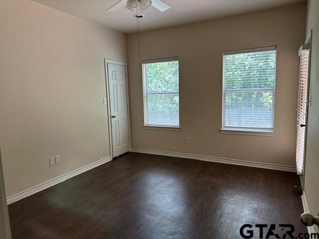 19602 FM 2493 Flint, TX 75762 - Photo 7 of 8 a view of an empty room with wooden floor and a window