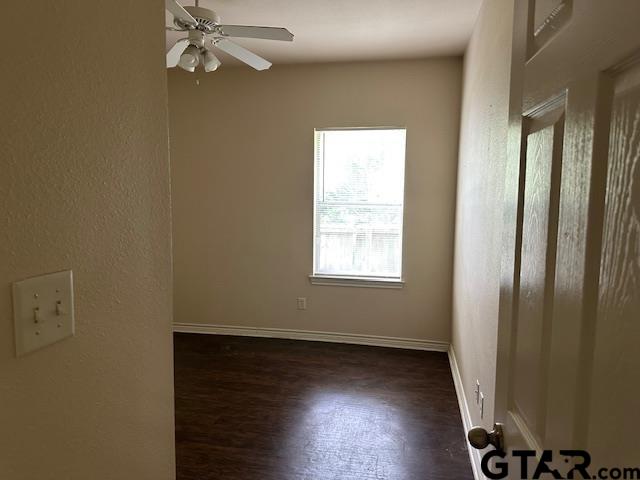 19602 FM 2493 Flint, TX 75762 - Photo 8 of 8 an empty room with wooden floor cabinet and windows