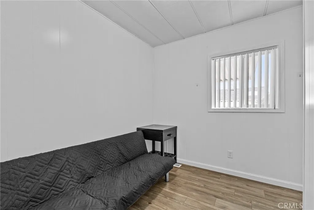 4000 Pierce Street, Unit 132 Riverside, CA 92505 - Photo 22 of 43 a living room with furniture and a window