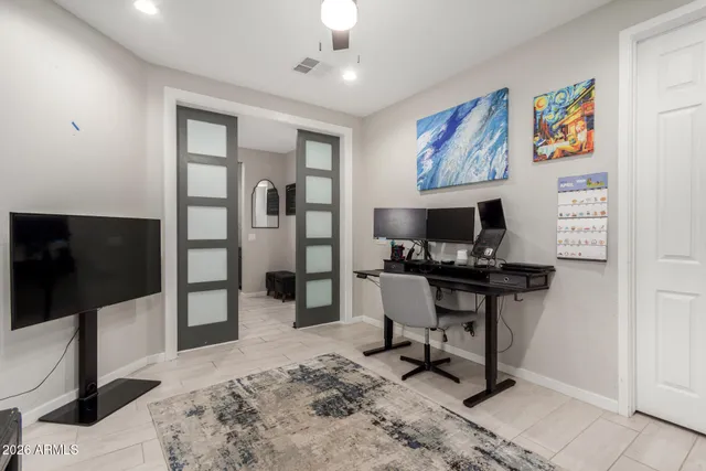 a kitchen with granite countertop stainless steel appliances and a counter top