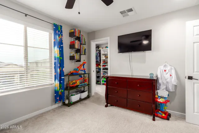 a patio with table and chairs